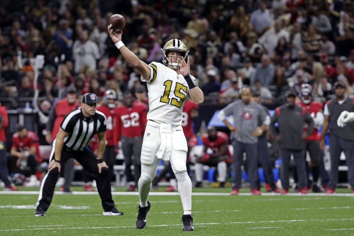 New Orleans Saints quarterback Trevor Siemian (15) passes in the second half of an NFL football game against the Tampa Bay Buccaneers in New Orleans, Sunday, Oct. 31, 2021. (AP Photo/Derick Hingle)