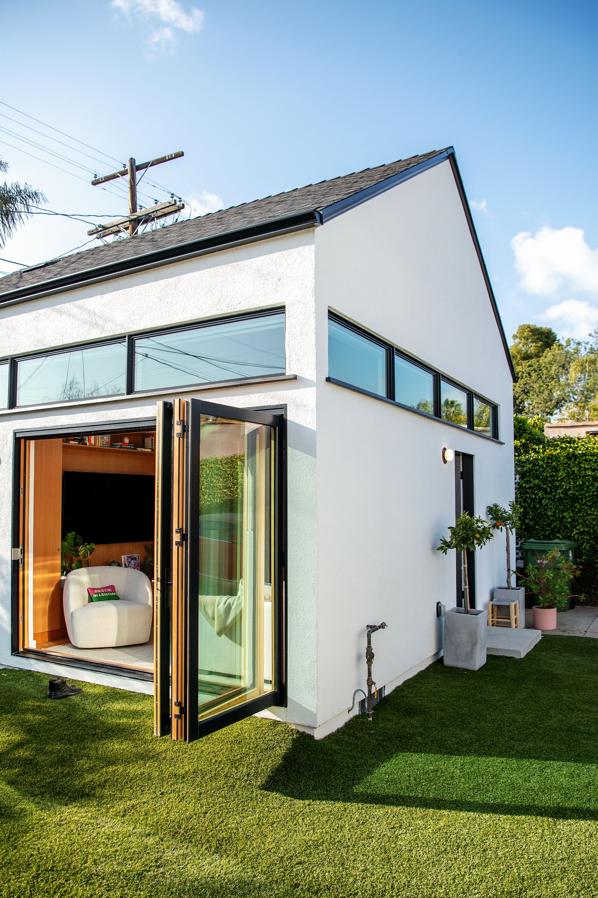 A bifold door on the ADU opens to the backyard. 