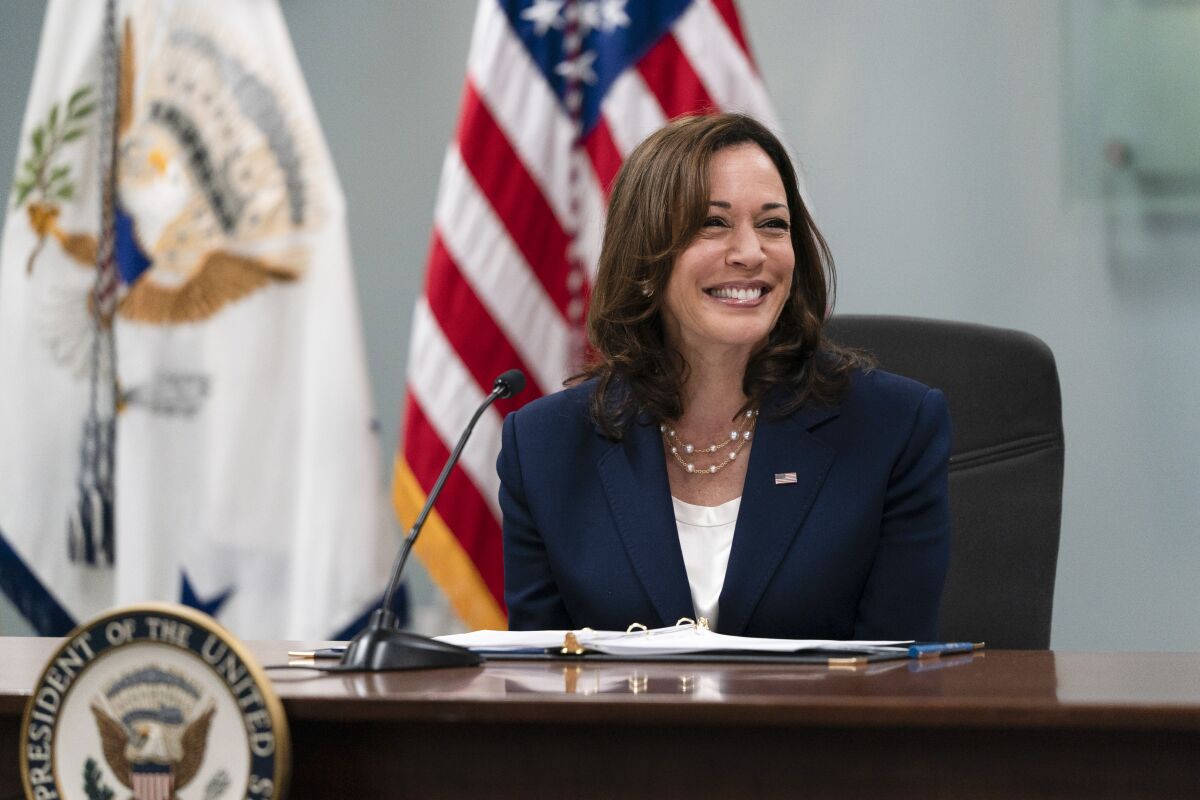 Vice President Kamala Harris smiles while speaking during a roundtable discussion with faith leaders in Los Angeles