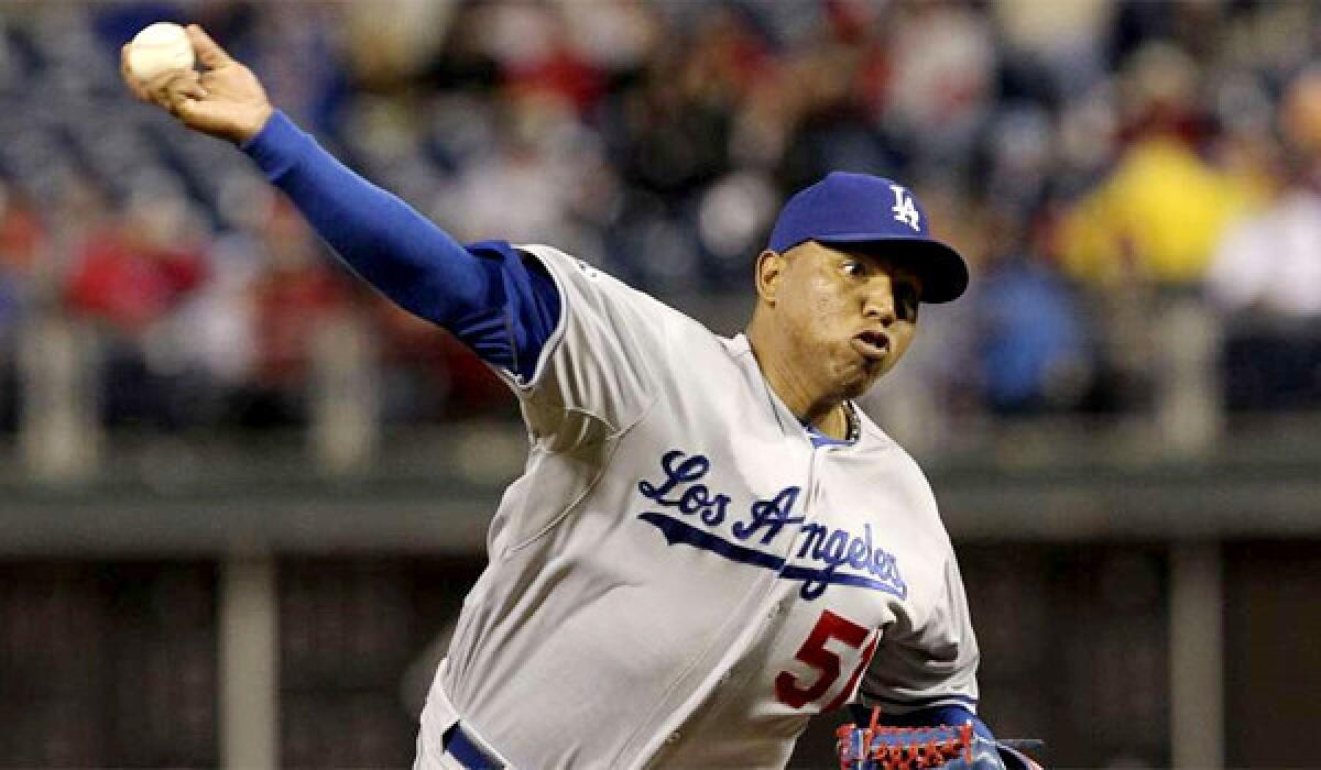Ronald Belisario went 8-1 for the Dodgers last season with a 2.54 ERA.
