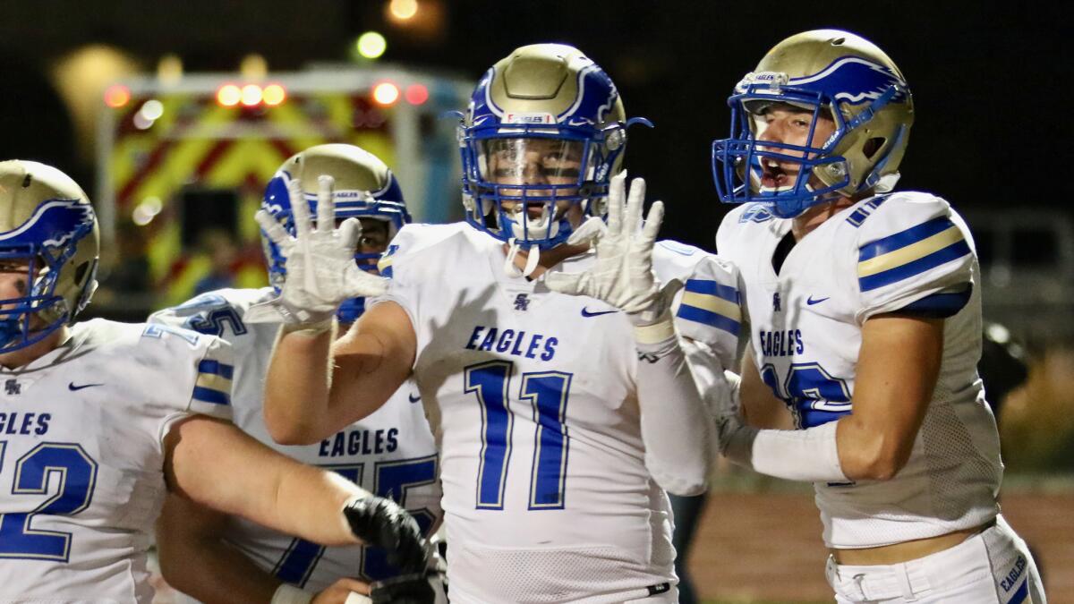 Santa Margarita tight end Jake Peters celebrates after catching the game-winning two-point conversion against JSerra on Oct. 27.