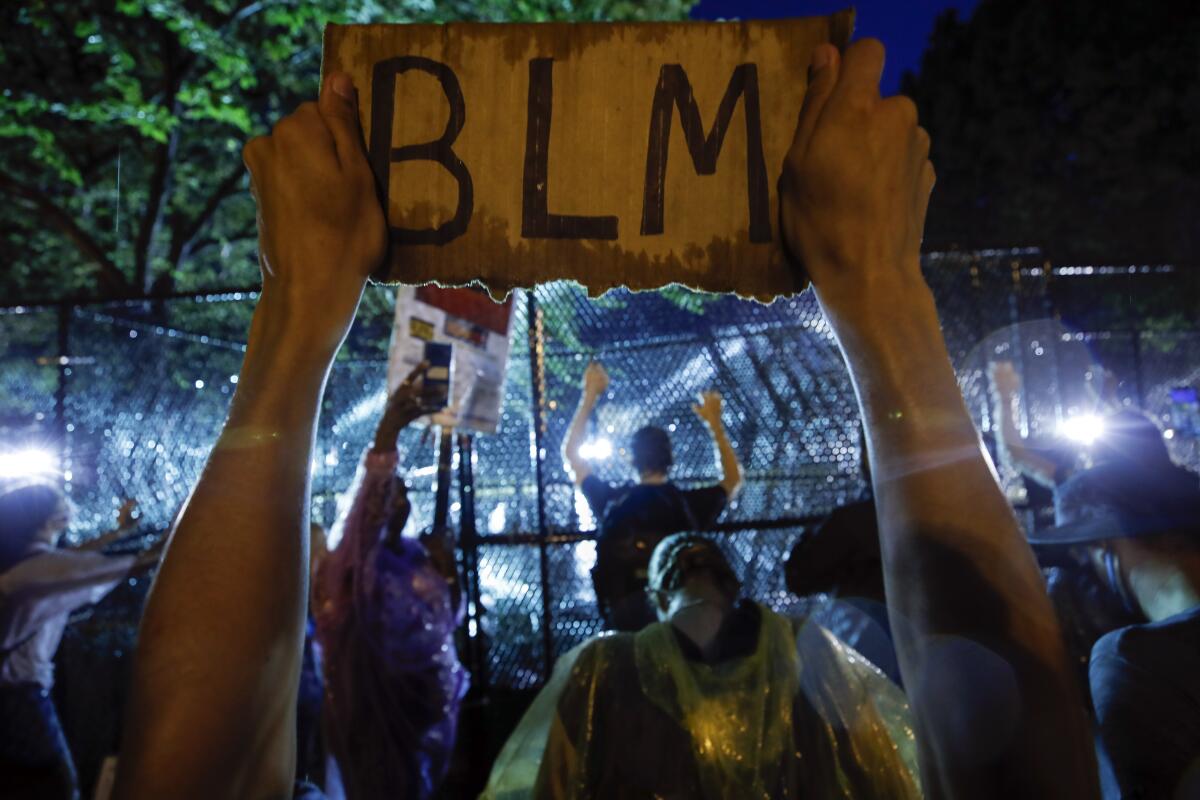 Demonstrators protest near the White House in June 4 over the murder of George Floyd by a Minneapolis police officer.