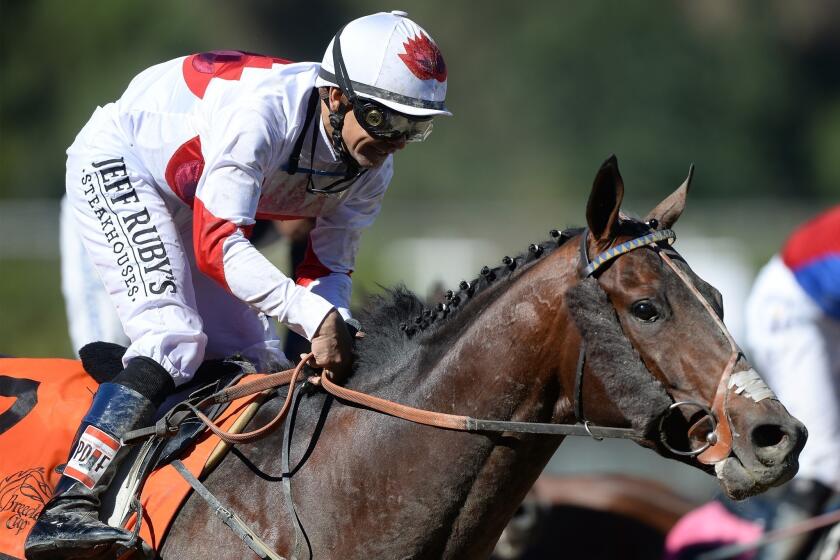 Jockey Mike Smith rides London Bridge to victory at the Breeders' Cup on Friday at Santa Anita.