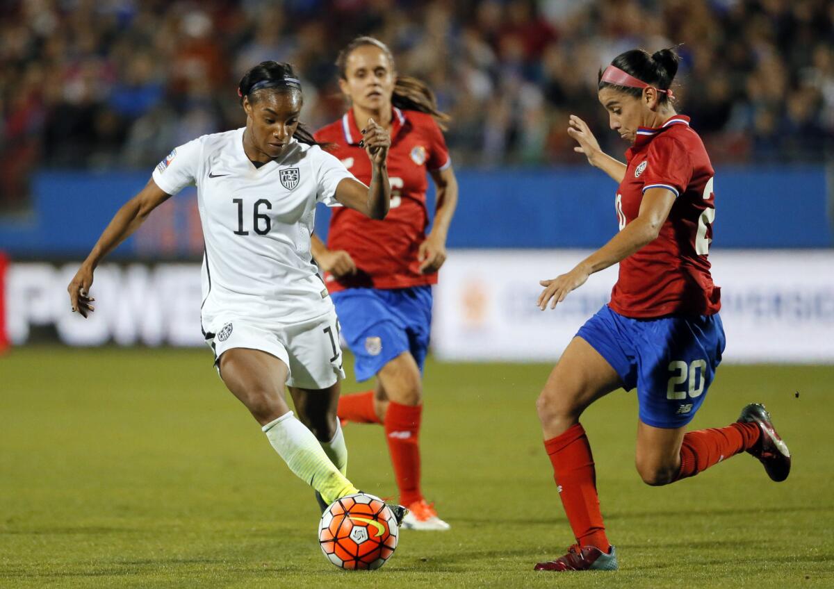 U.S. forward Crystal Dunn (16) controls the ball as Costa Rica midfielder Wendy Acosta (20) defends during the first half of a CONCACAF Olympic qualifying match on Feb. 10.