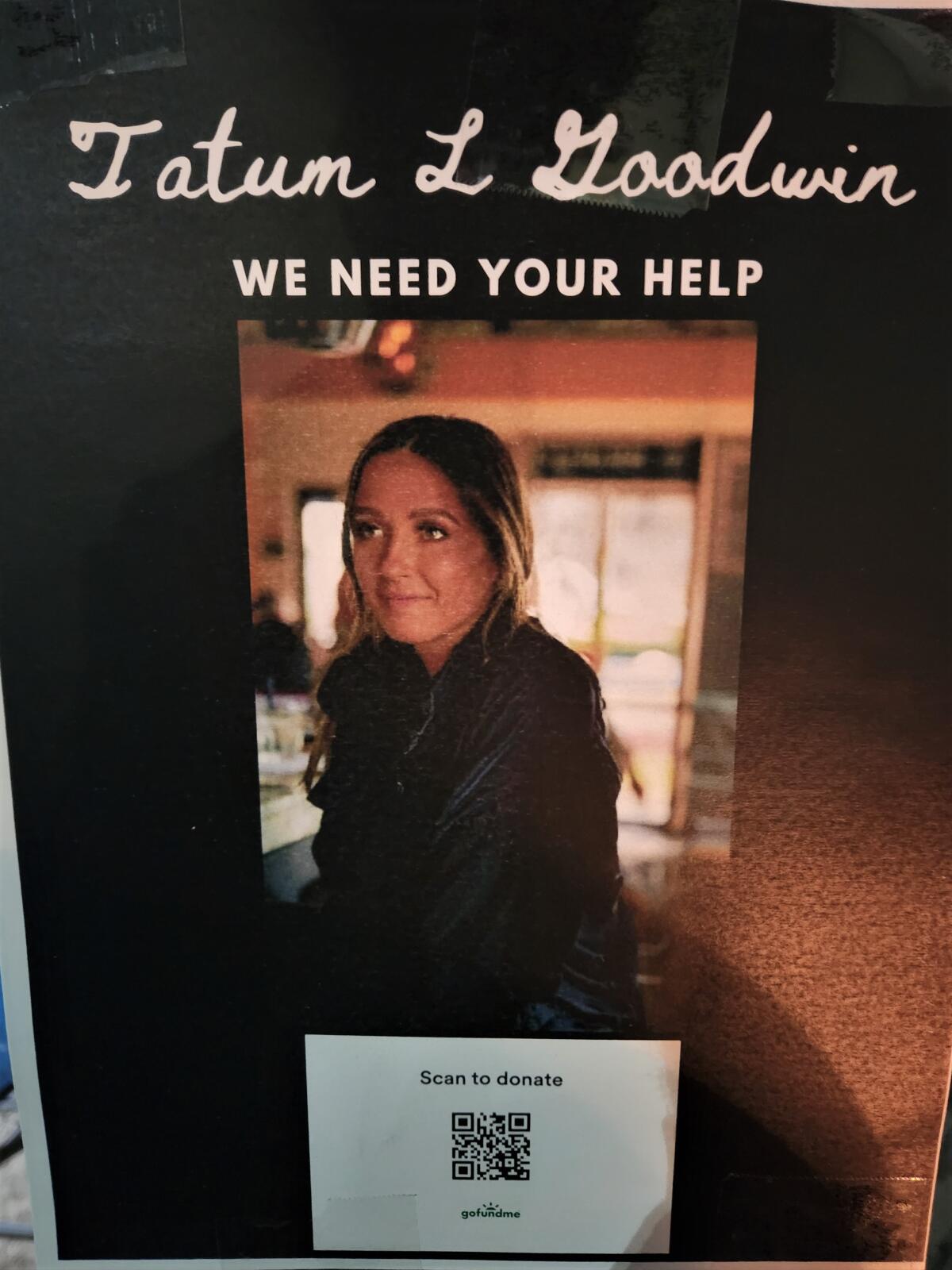 A poster depicts Tatum Goodwin, whose body was found in Laguna Beach Sunday. 
