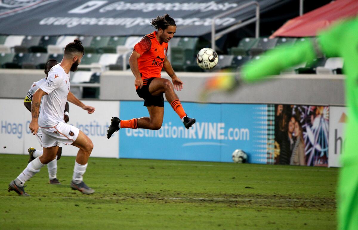 OCSC midfielder Seth Casiple tries to control the ball vs. Phoenix Rising at Championship Stadium.