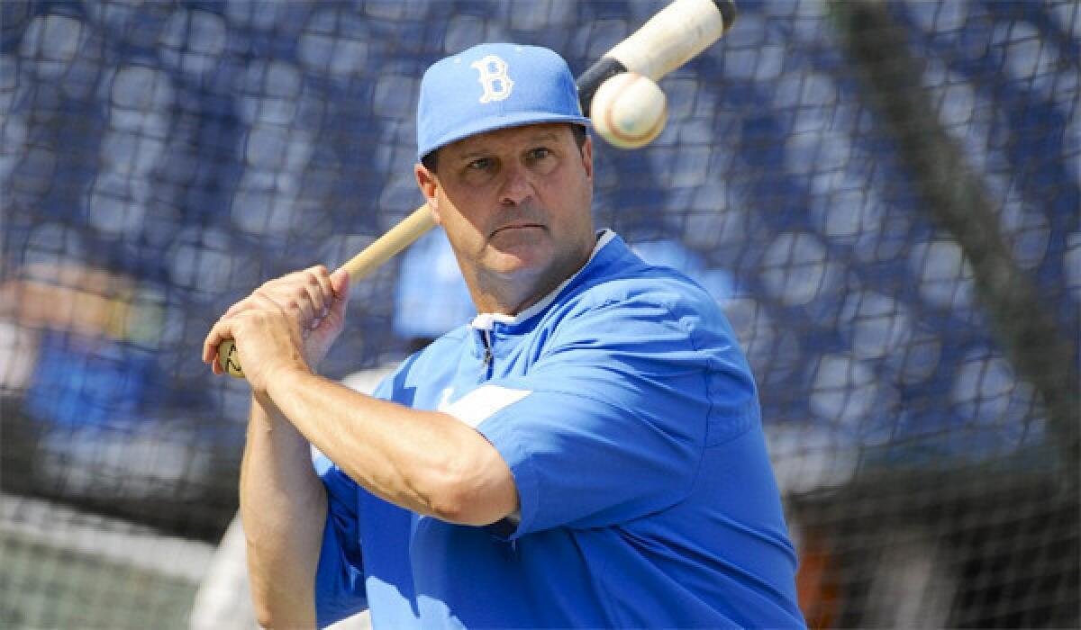 Baseball coach John Savage will remain with UCLA despite USC's attempt to woo him away.