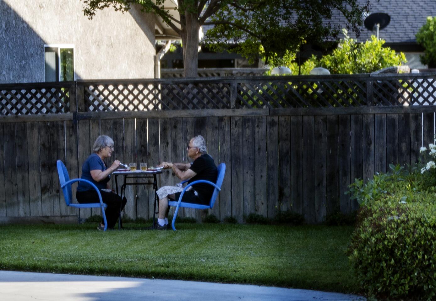 Riverside residents dine outside their home during coronavirus pandemic