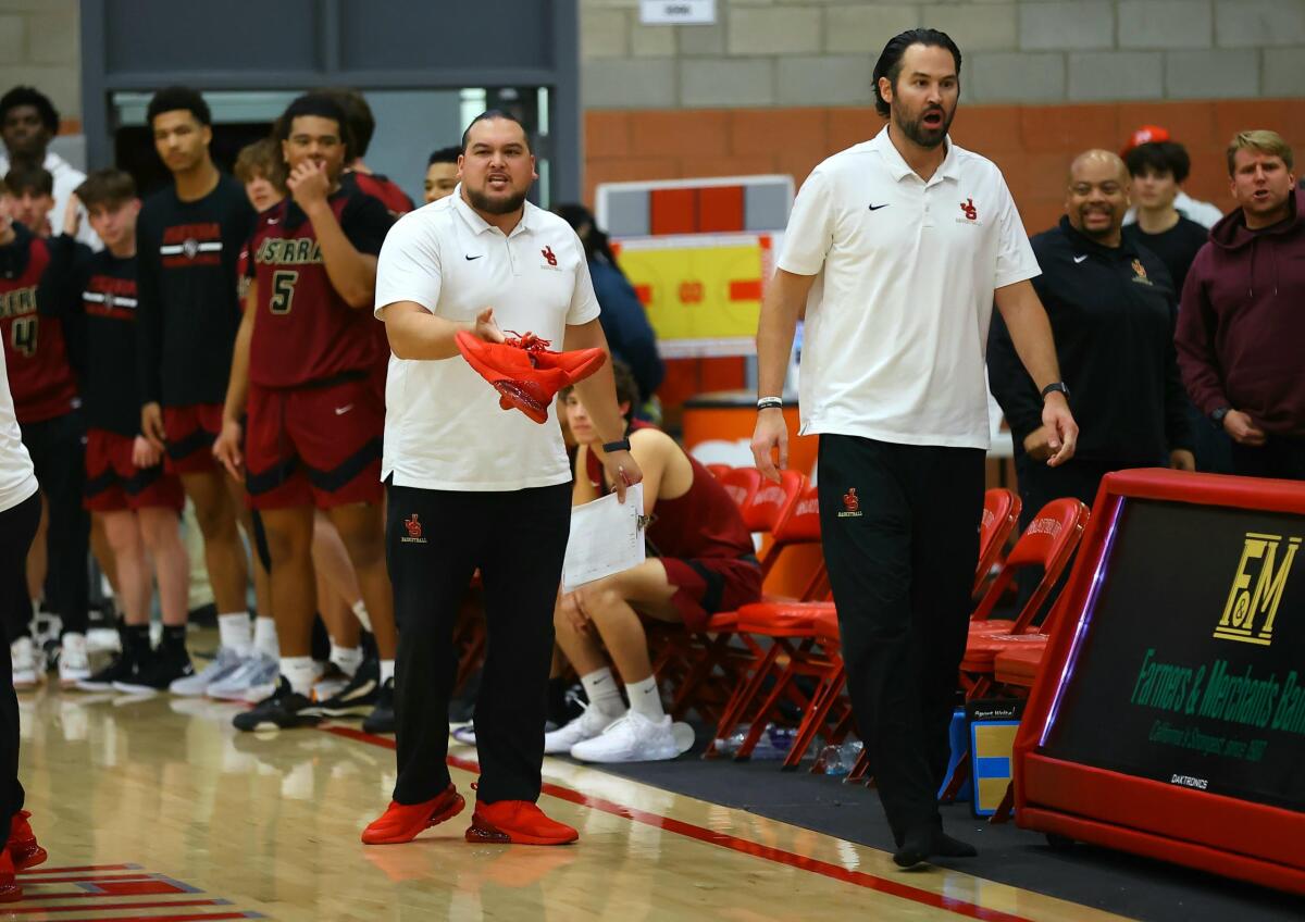 JSerra coach Keith Wilkinson, right, received a six-game suspension from the Southern Section. 