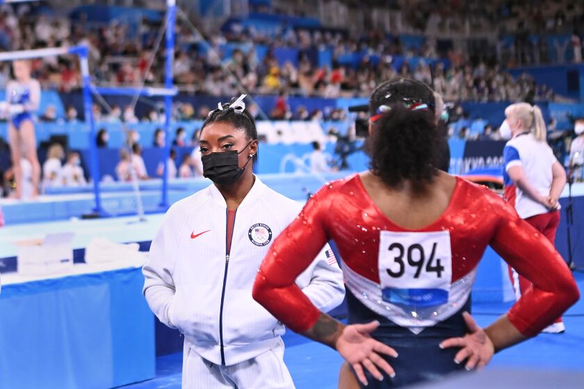 -TOKYO,JAPAN July 26, 2021: USA's Simone Biles looks on after pulling out of the women's team final at the 2020 Tokyo Olympics. (Wally Skalij /Los Angeles Times)