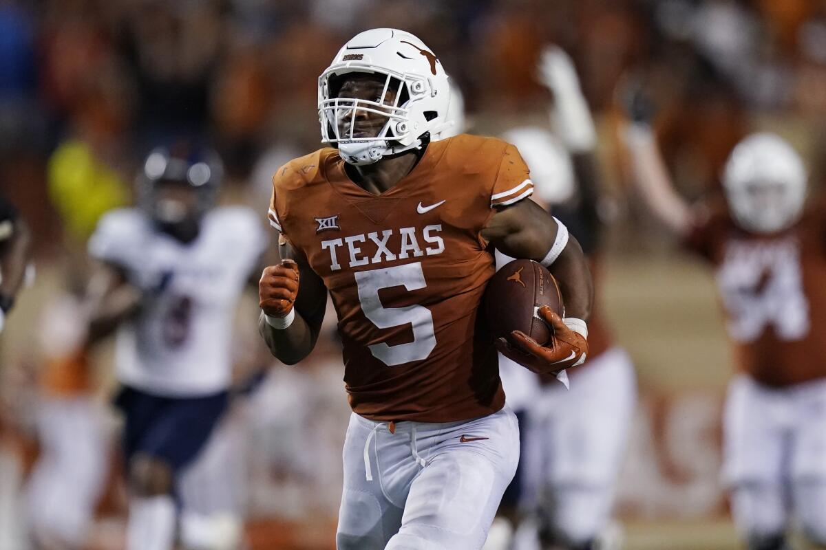 Texas running back Bijan Robinson scores on a touchdown run against Texas-San Antonio in September.