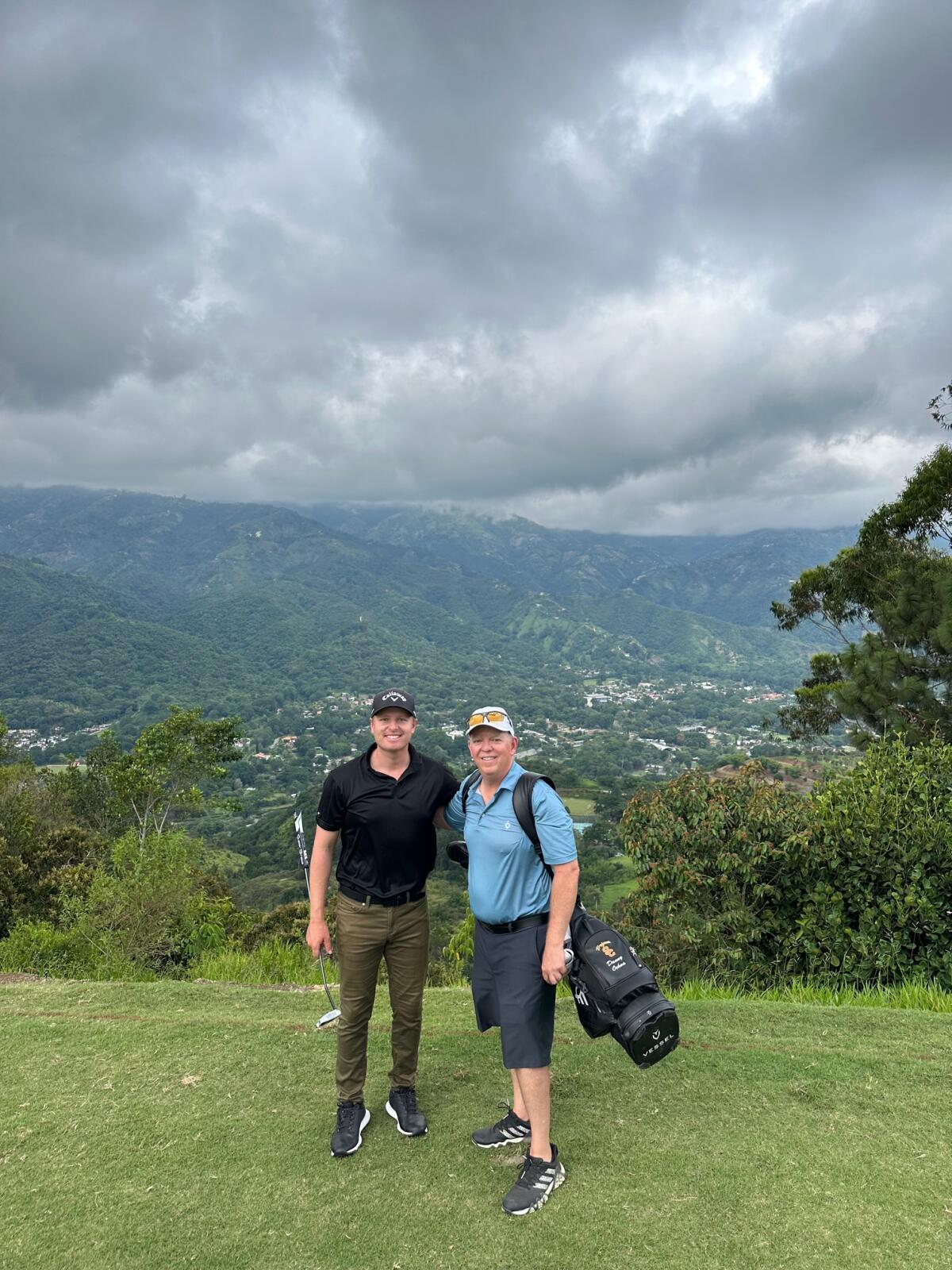 Danny Ochoa and Herb Morgan on the course in Colombia.