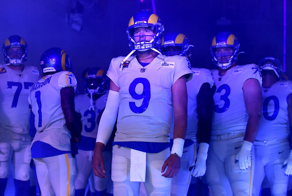 Quarterback Matthew Stafford readies to lead the Rams onto the football field.