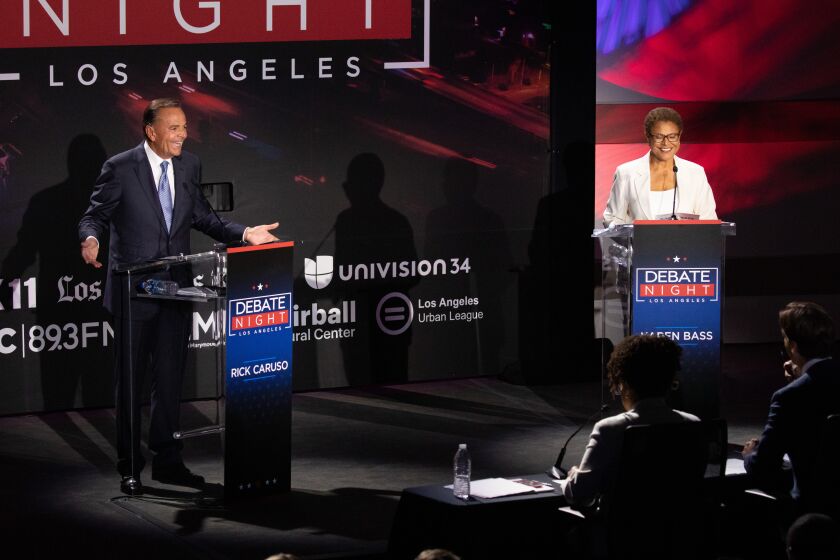 LOS ANGELES, CA - SEPTEMBER 21: Businessman Rick Caruso faces Congresswoman Karen Bass during the Los Angeles mayoral debate at the Skirball Cultural Center on Wednesday, Sept. 21, 2022 in Los Angeles, CA. (Myung J. Chun / Los Angeles Times)