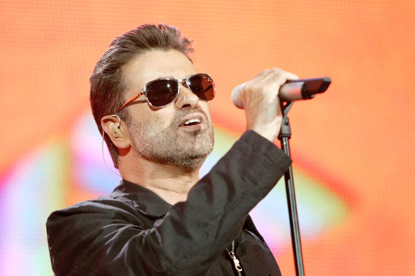 George Michael performs on stage at "Live 8 London" in Hyde Park on July 2, 2005 in London