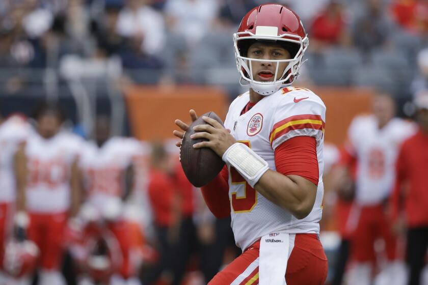 FILE - In this Aug. 25, 2018, file photo, Kansas City Chiefs' Patrick Mahomes looks for a receiver during the first half of the team's preseason NFL football game against the Chicago Bears in Chicago. The Chiefsâ first-round pick in last yearâs draft, Mahomes is poised to begin his NFL quarterback career in earnest after the offseason trade of Alex Smith to Washington.(AP Photo/Annie Rice, File)