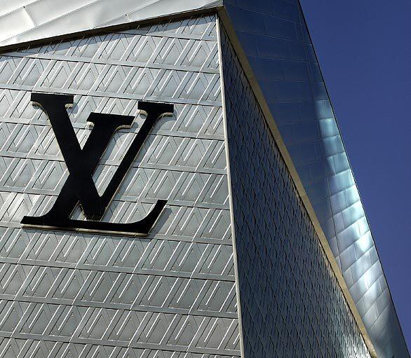 An architectural detail of the Louis Vuitton store sign at Crystals.