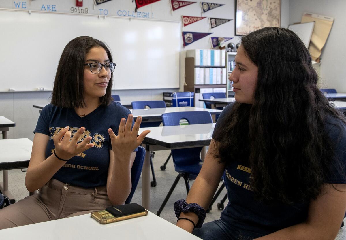 Mehraeel Gouda, left, talks to her best friend Katerin, in the IDEAS club at Warren High School.
