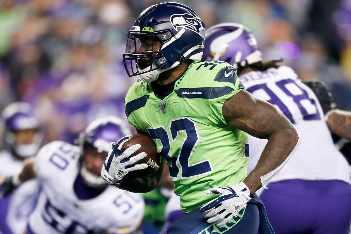 Seahawks running back Chris Carson rushed for 102 yards in 23 carries and had a touchdown in Seattle's 37-30 victory over the Minnesota Vikings on Nov. 2.