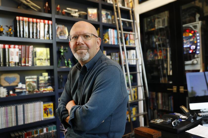 LOS ANGELES, CA - AUGUST 19, 2019 Marc Guggenheim, who serves as the showrunner of Amazon's Victorian fantasy drama, "Carnival Row," which stars Orlando Bloom and Cara Delevingne photographed in his Los Angeles office August 19, 2019. (Al Seib / Los Angeles Times)