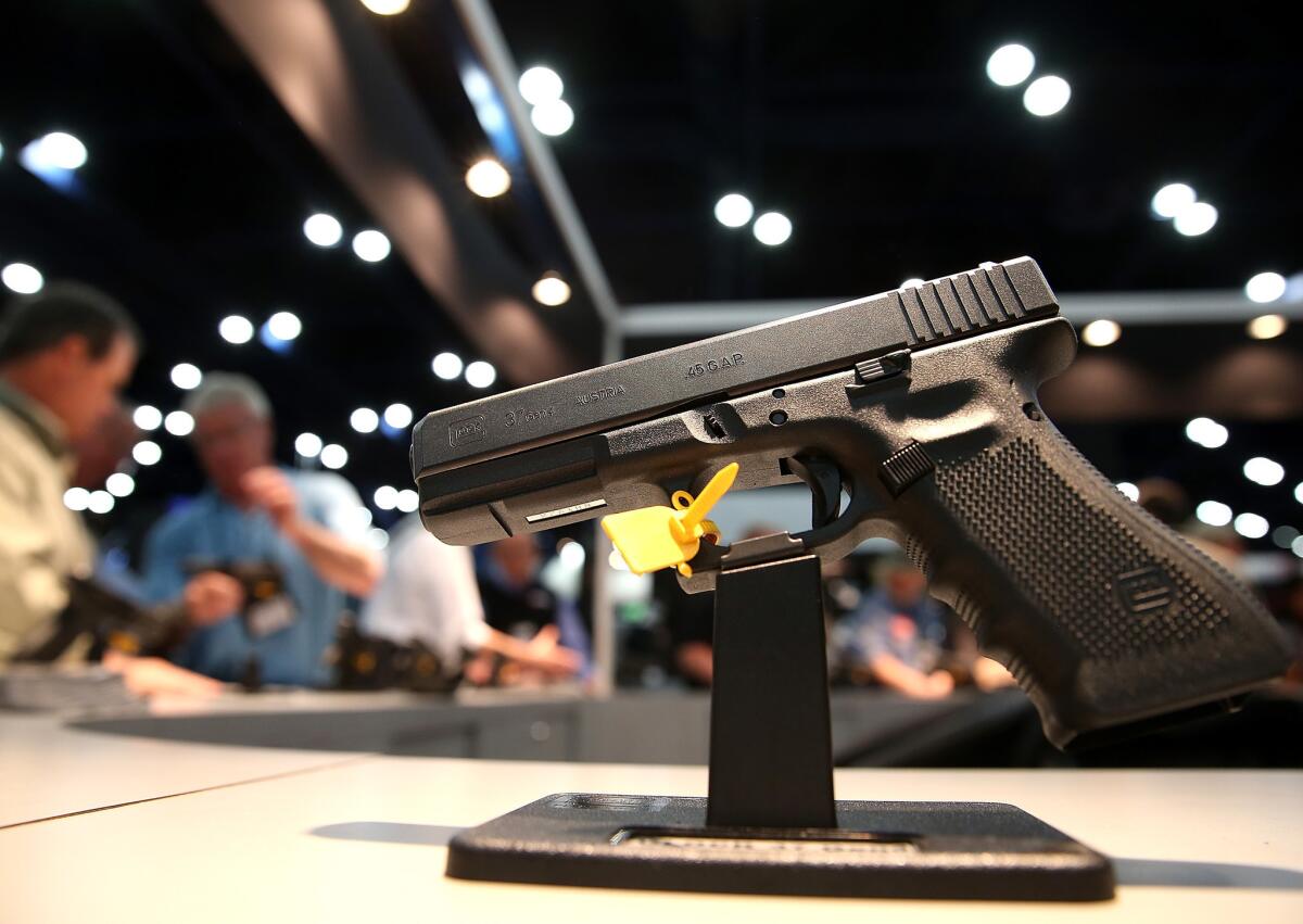 A handgun is displayed during the 2013 NRA Annual Meeting and Exhibits at the George R. Brown Convention Center in Houston, Texas. The guns involved in the vast majority of crimes are everyday handguns.