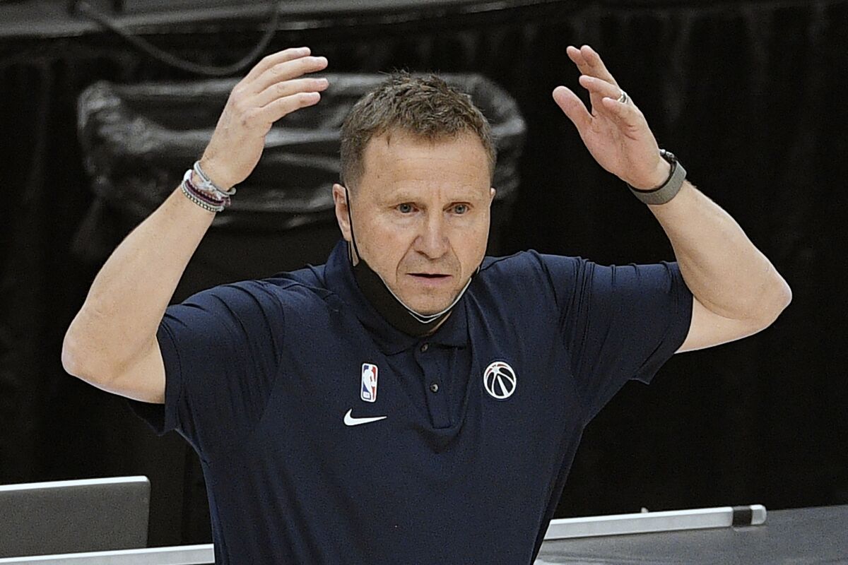 FILE - Washington Wizards head coach Scott Brooks gestures during the second half of an NBA basketball game against the Charlotte Hornets in Washington, in this Sunday, May 16, 2021, file photo. Scott Brooks is out as coach of the Washington Wizards, said a person with knowledge of the situation. The person spoke to The Associated Press Wednesday, June 16, 2021, on condition of anonymity because the team hadn't publicly announced the decision. (AP Photo/Nick Wass, File)