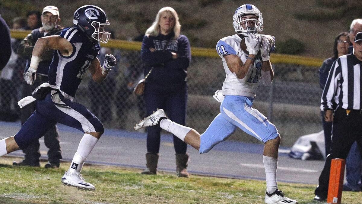 Corona del Mar's Bradley Schlom makes a second-quarter catch for a touchdown against Camarillo in the semifinals of the CIF Southern Section Division 4 football playoffs at Adolfo Camarillo High on Nov. 16, 2018.