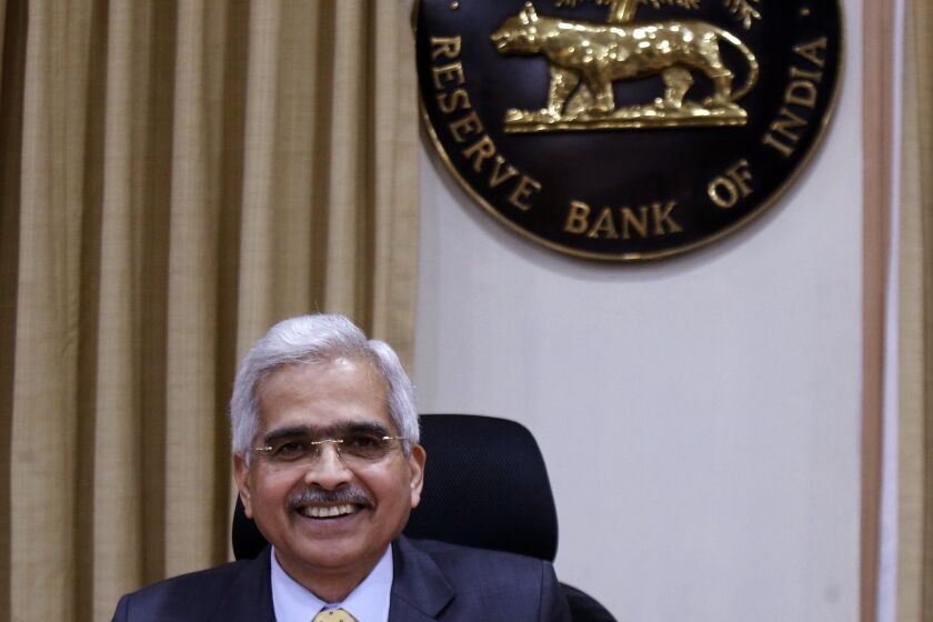 FILE - Reserve Bank of India (RBI) Governor Shaktikanta Das gestures during a press conference after RBI's bi-monthly monetary policy review meeting in Mumbai, India, on Feb. 6, 2020. India’s central bank on Friday, Sept. 30, 2022, raised its key interest rate by 50 basis points to 5.90% in its fourth hike this year and said the economies of developing countries were confronted with challenges of slowing growth, elevated food and energy prices, debt distress and currency depreciation. (AP Photo/Rajanish Kakade, File)