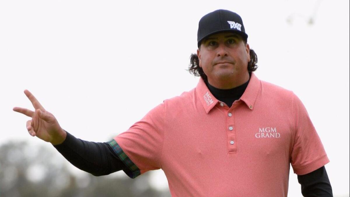 Pat Perez reacts to his birdie on the 18th hole Saturday during a continuation of the second round at the Genesis Open at Riviera Country Club.