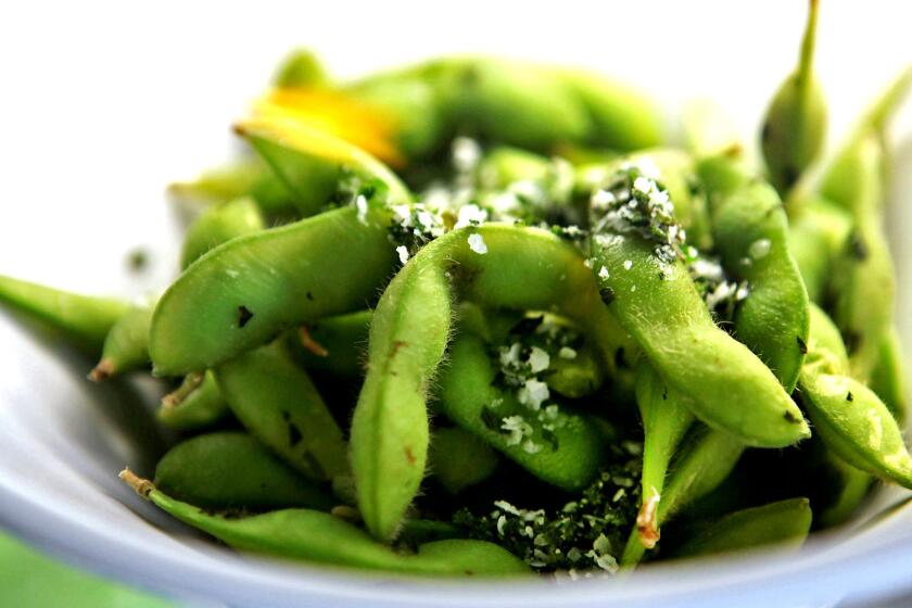 Researchers say eating soy, such as edamame, as a teen can help prevent breast cancer later.