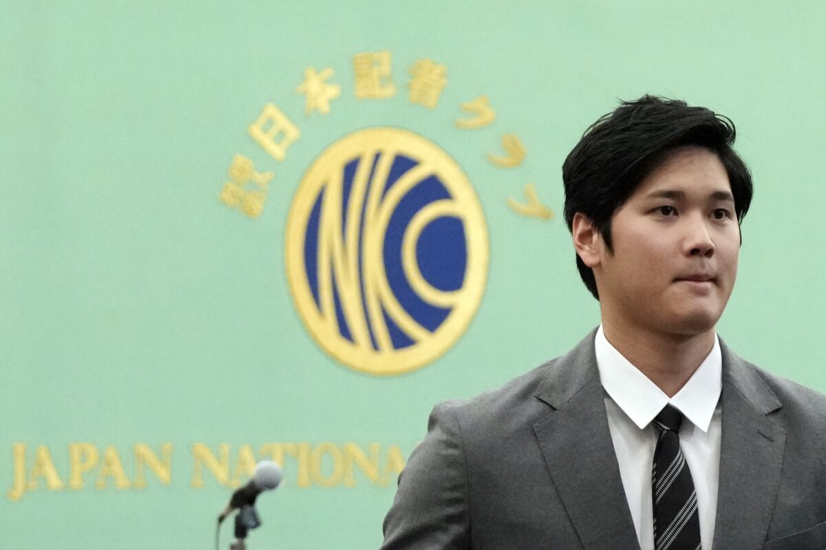 Los Angeles Angels' Shohei Ohtani attends a press conference at the Japan National Press Club Monday, Nov. 15, 2021, in Tokyo. (AP Photo/Eugene Hoshiko)