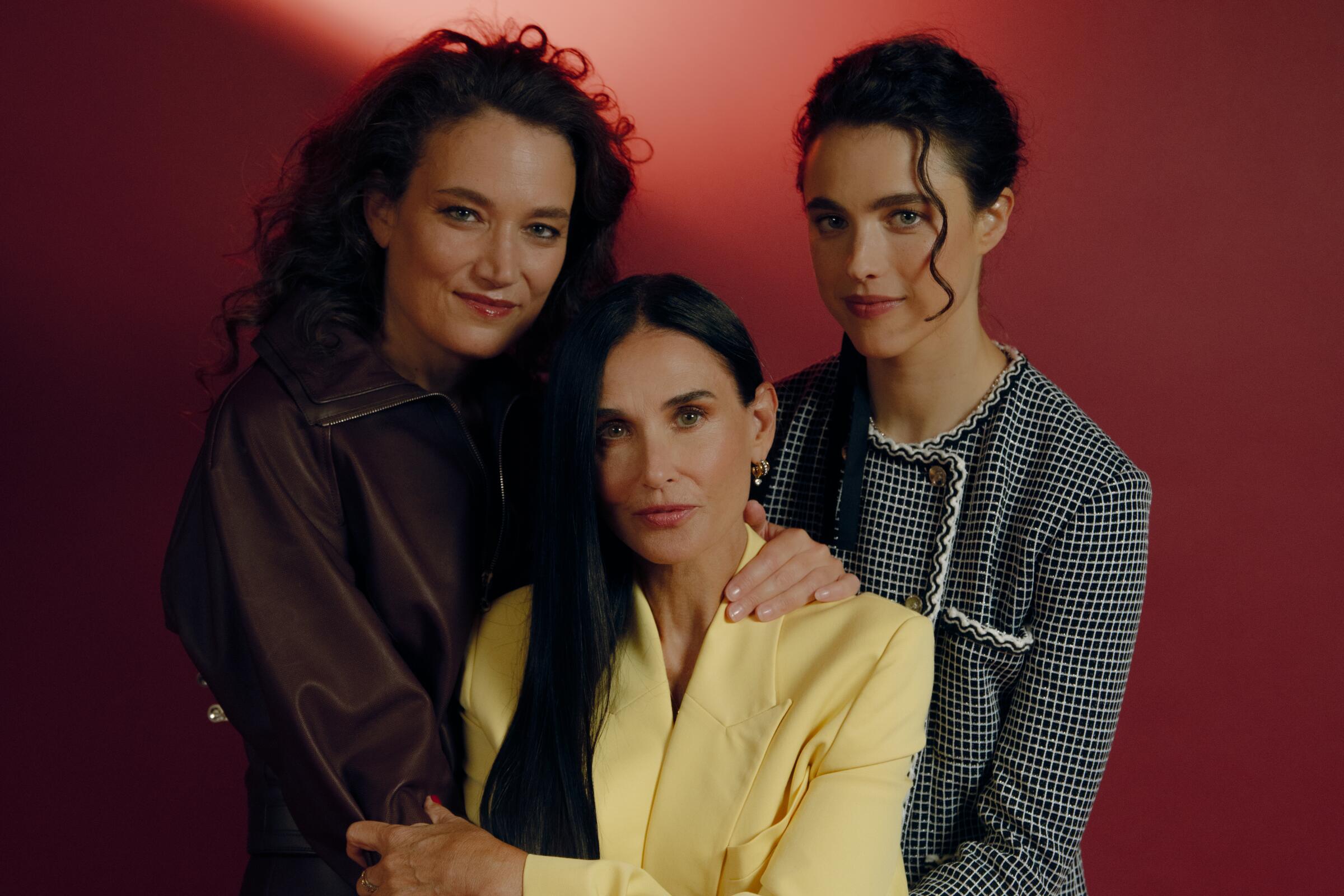 Director Coralie Fargeat with Demi Moore and Margaret Qualley