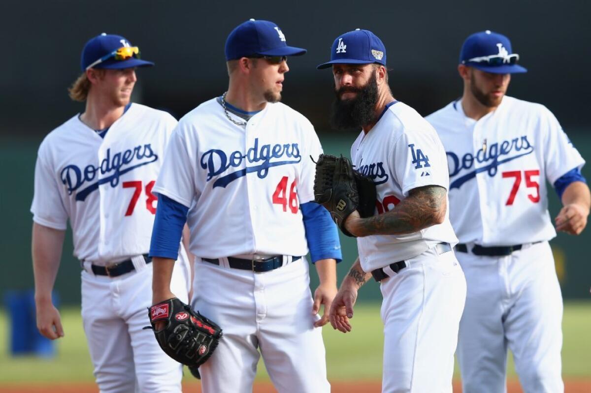Spin this: Brian Wilson and teammates prepare for a drill Wednesday in Sydney.