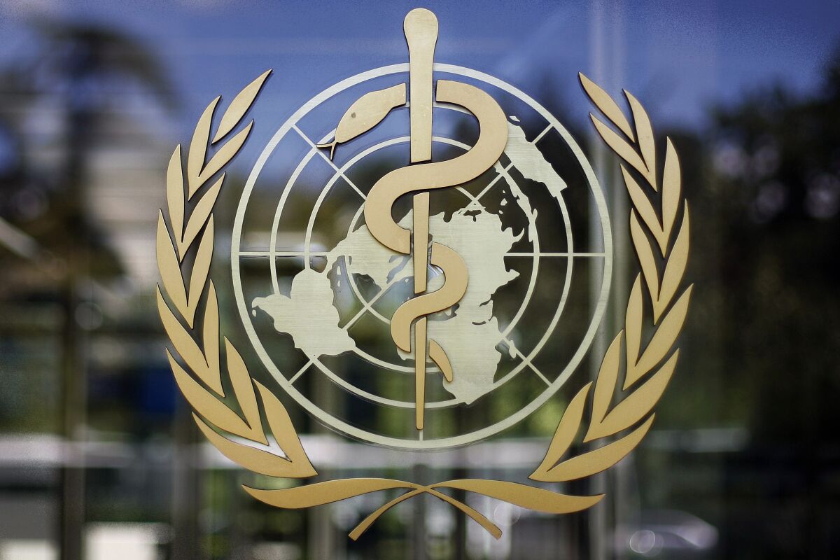 The logo of the World Health Organization at the WHO headquarters in Geneva, Switzerland