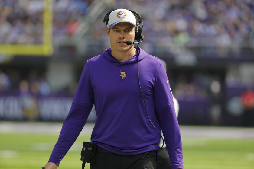 Minnesota Vikings head coach Kevin O'Connell watches from the sideline during the first half of an NFL football game against the Los Angeles Chargers, Sunday, Sept. 24, 2023, in Minneapolis. (AP Photo/Bruce Kluckhohn)