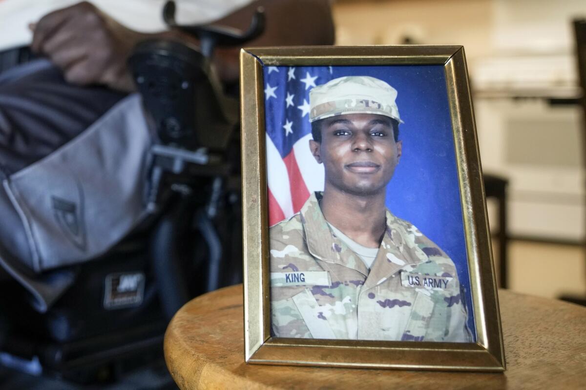 A portrait of Army Pvt. Travis King is displayed at a relative's home.