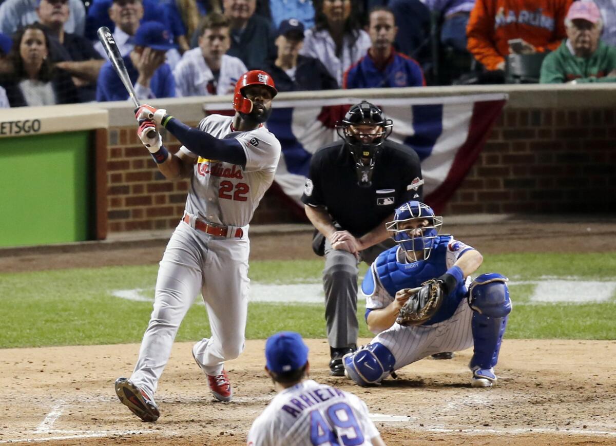 Cardinals outfielder Jason Heyward (22) hits a home run against the Cubs in the NLDS. Could he be a target for the Angels during the winter meetings?