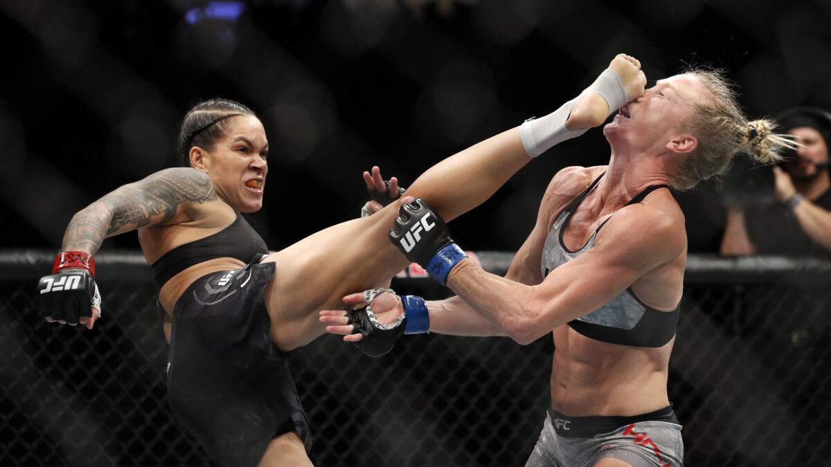Amanda Nunes lands the kick that knocked out Holly Holm at 4:10 of the first round Saturday night at UFC 239.