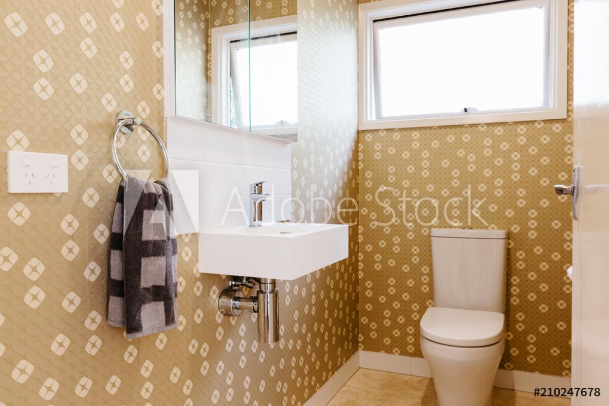 Colors and patterns pop in a powder room.