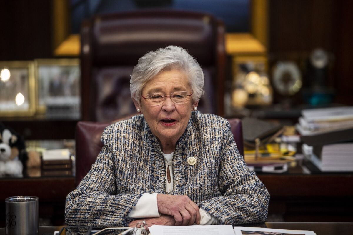 FILE - Alabama Gov. Kay Ivey holds a sit down interview with reporters in the Governor's office at the Alabama State Capitol Building in Montgomery, Ala., on Wednesday, Feb. 3, 2021. A federal judge on Friday, May 13, 2022 blocked part of an Alabama law that made it a felony to prescribe gender-affirming puberty blockers and hormones to transgender minors. U.S. District Judge Liles Burke issued a preliminary injunction to stop the state from enforcing the medication ban, which took effect May 8, while a lawsuit goes forward.(Jake Crandall/The Montgomery Advertiser via AP, File)