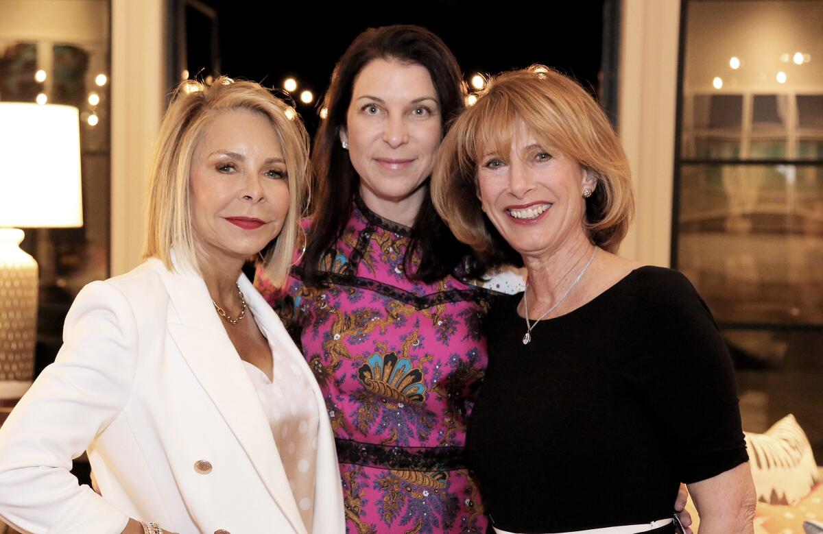 From left, Paula Davis, Barbara Adler, and Judith Angel welcomed supporters of Providence St. Joseph Medical Center to raise funds for the Minutes Matter Emergency Services campaign.