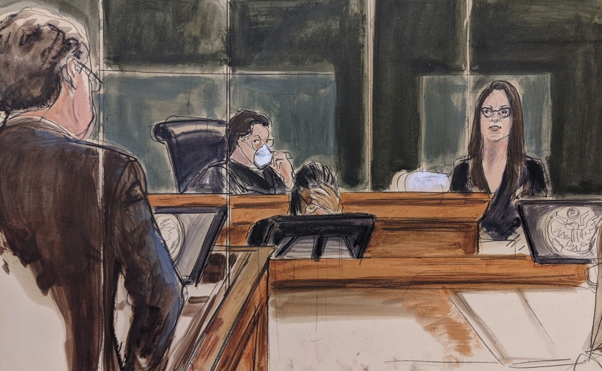 Defense attorney Christian Everdell, (left at podium,) questions the first defense witness Cimberly Espinoza, Ghislaine Maxwell's former assistant as Judge Alison Nathan, center, listens from the bench, Thursday, Dec. 16, 2021, in New York. (Elizabeth Williams via AP)