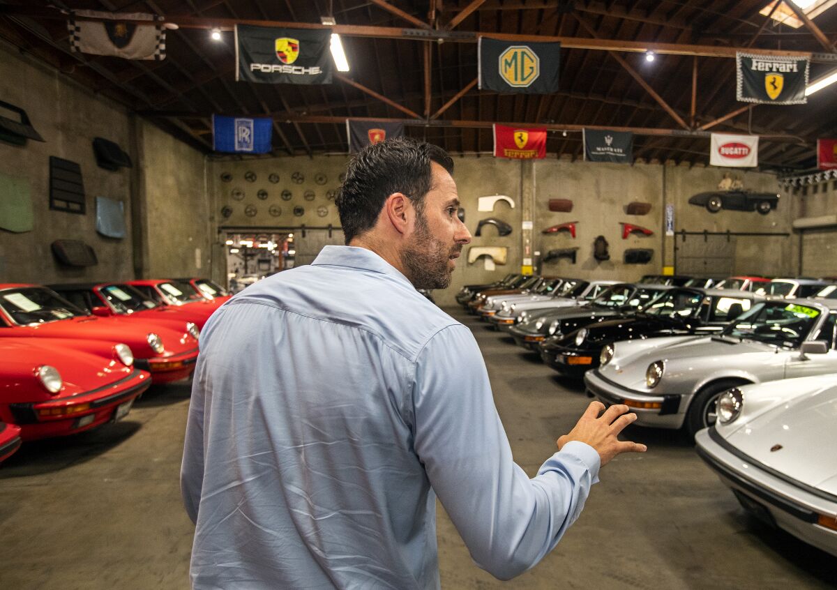 Alex Manos at his classic car dealership.