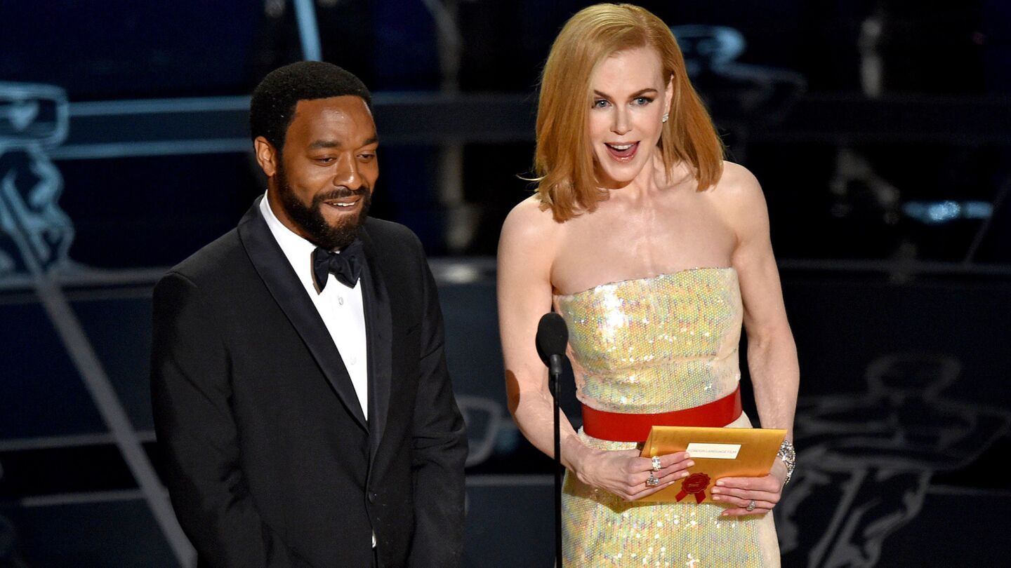 Chiwetel Ejiofor and Nicole Kidman present the award for foreign language film.