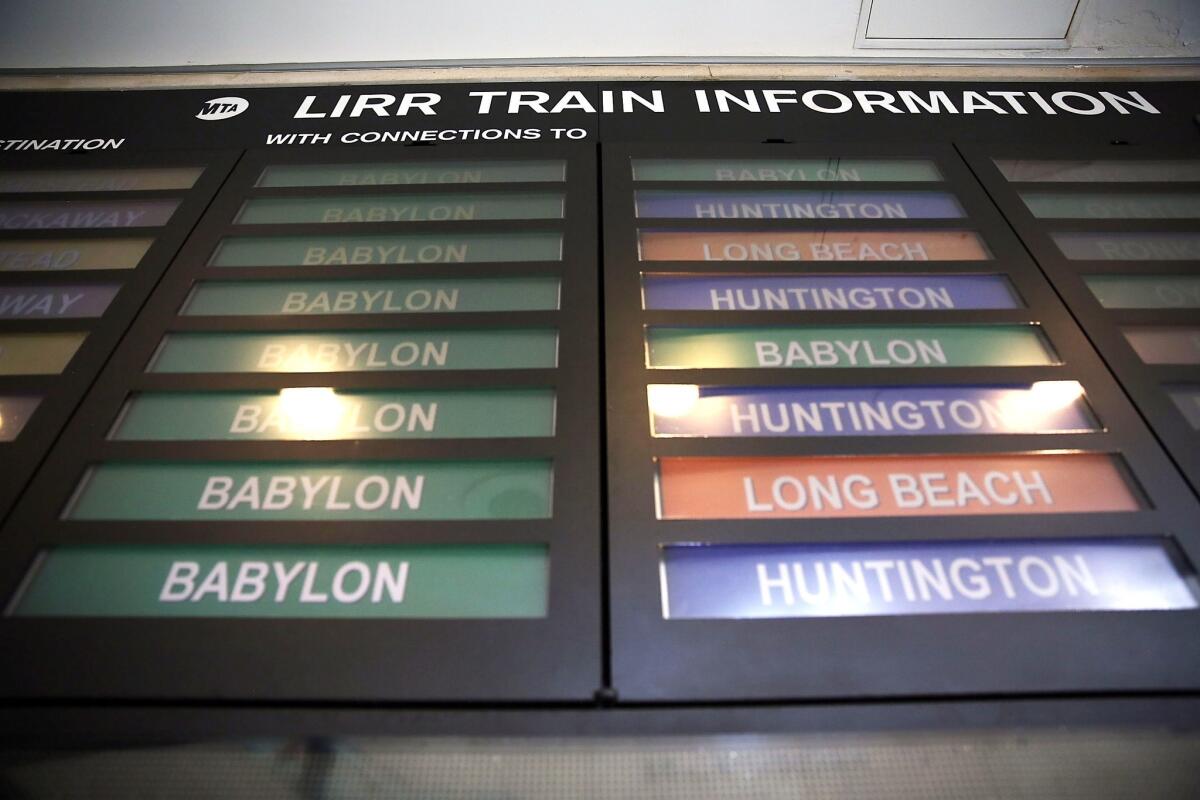 A Long Island Rail Road (LIRR) schedule board hangs in a train station in Brooklyn.