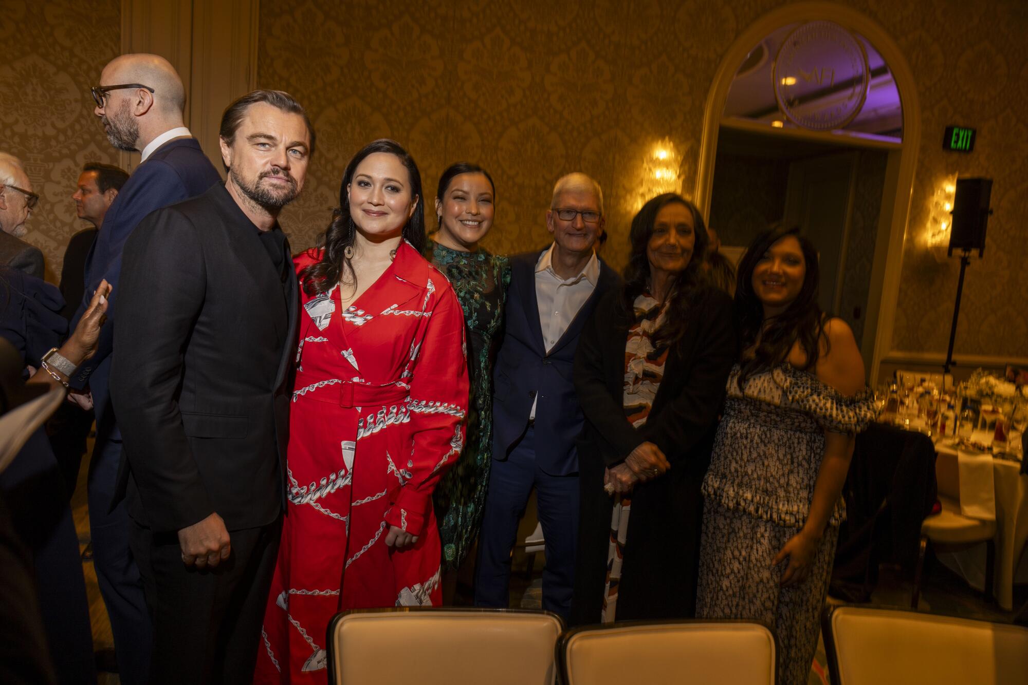 Leonardo DiCaprio, Lily Gladstone, JaNae Collins and Tim Cook during the 2023 American Film Institute Awards.