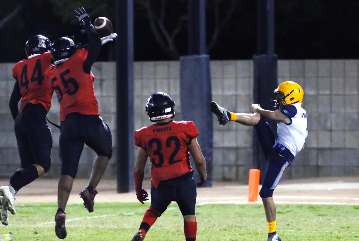 Marina's Dylan Keidel (1) has his punt blocked against Katella in a Big 4 League football game on Thursday.