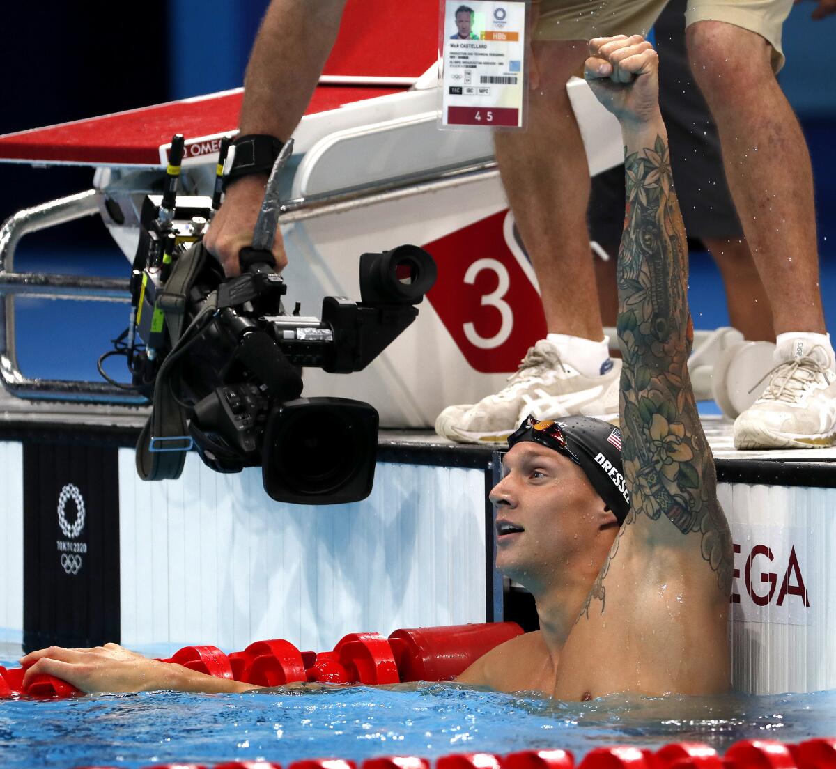 Caeleb Dressel celebrates after winning the 100-meter butterfly at the Tokyo Games on Saturday.