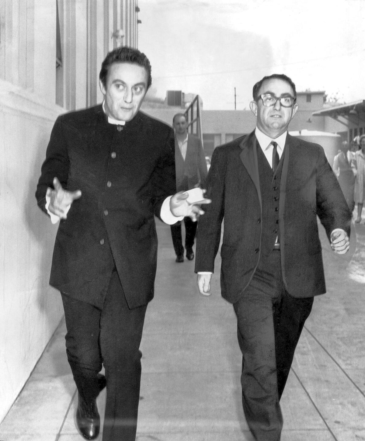Comic Lenny Bruce, left, leaves jail in Van Nuys with attorney Seymour Lazar in 1962. In 2007, Lazar pleaded guilty to obstruction of justice, filing a false tax return and making a false declaration.
