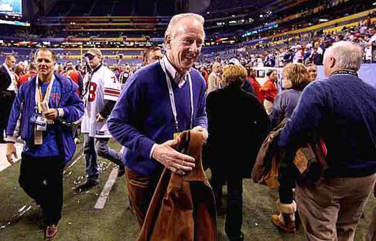 Archie Manning, New Orleans Saints legend and father of Giants quarterback Eli Manning, leaves the field at Lucas Oil Stadium in Indianapolis after his son led New York to a 21-17 victory over New England in Super Bowl XLVI.